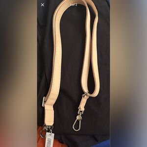 Adjustable tan leather Consuela strap. New with tags